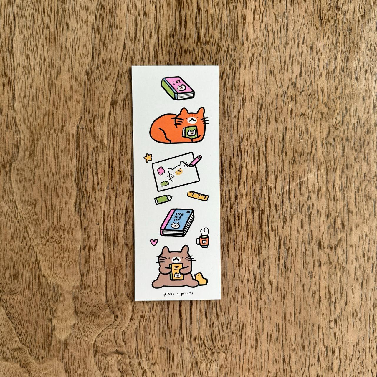 Cats reading Bookmark