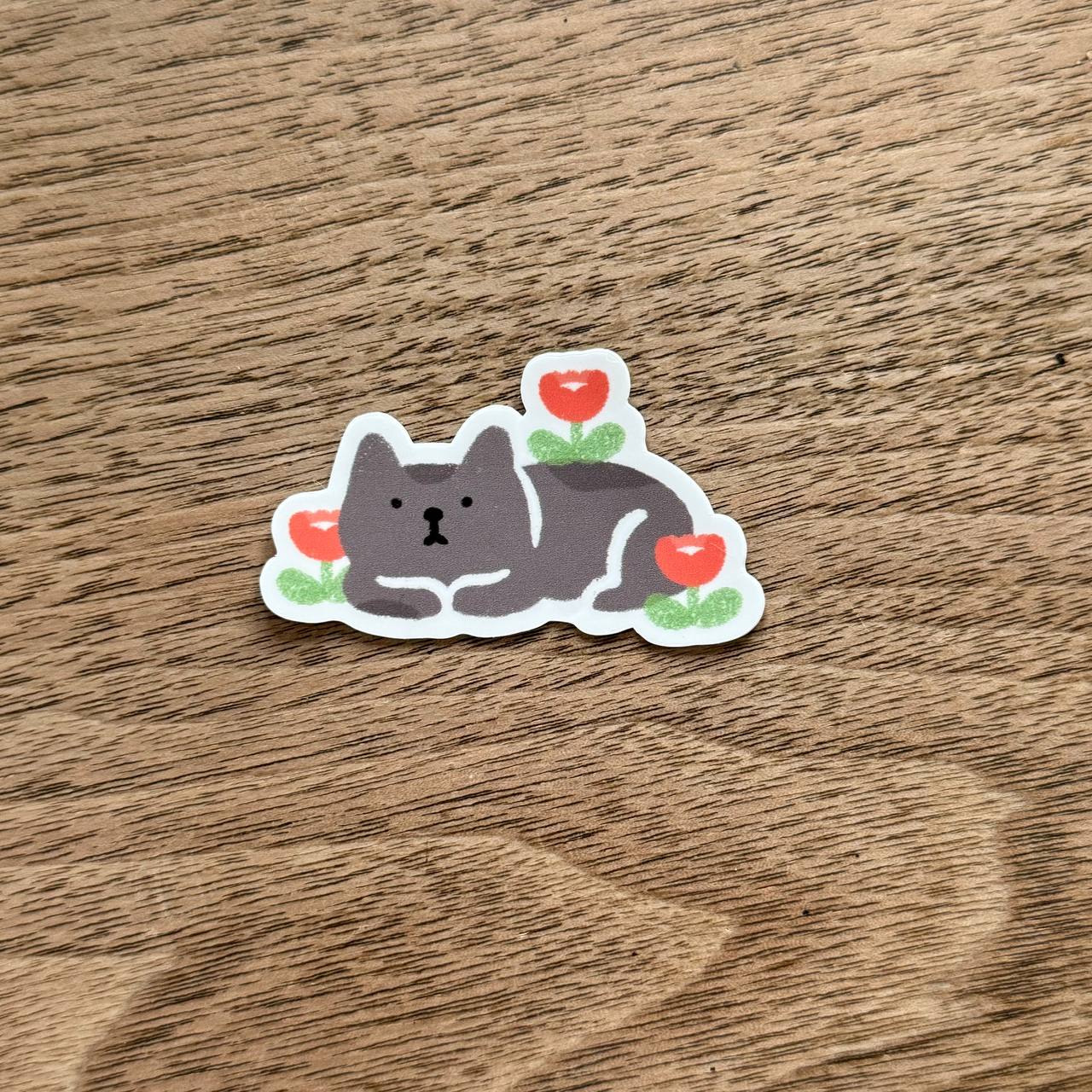 Cat loaf in flowers (Patreon sticker)