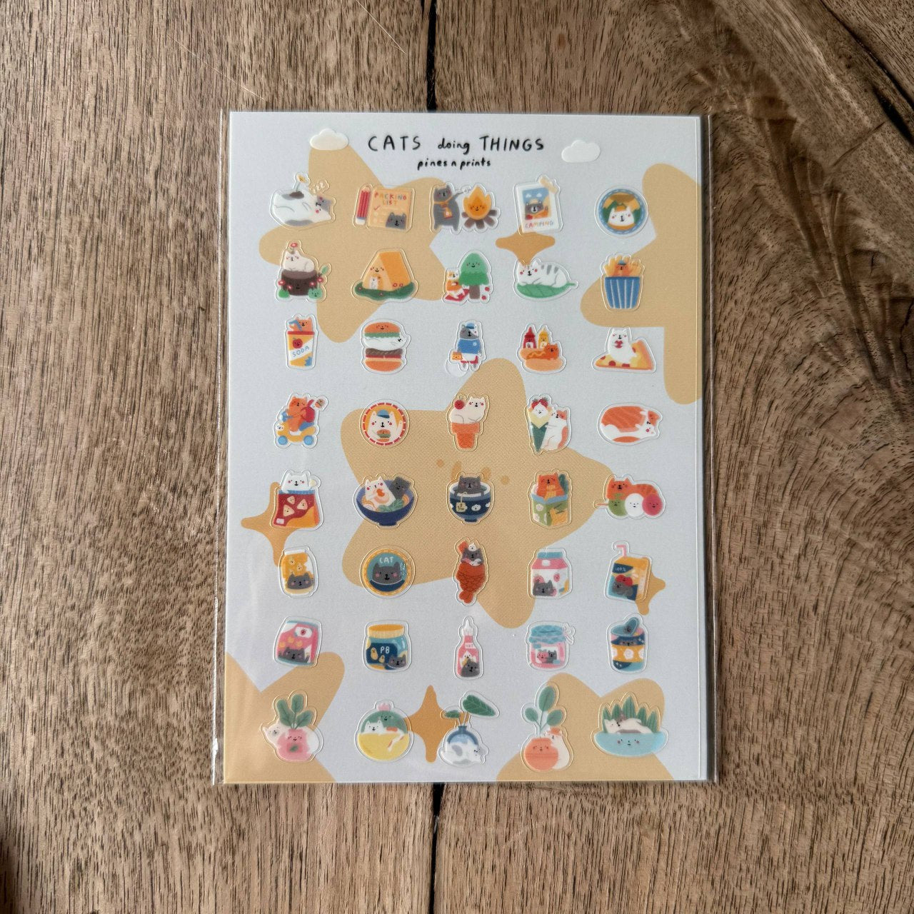 Cats doing things transparent sticker sheet